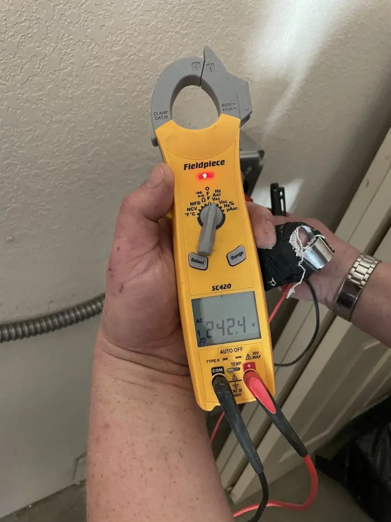 Voltage testing with clamp meter during Aluminum Wiring Replacement in Valparaiso